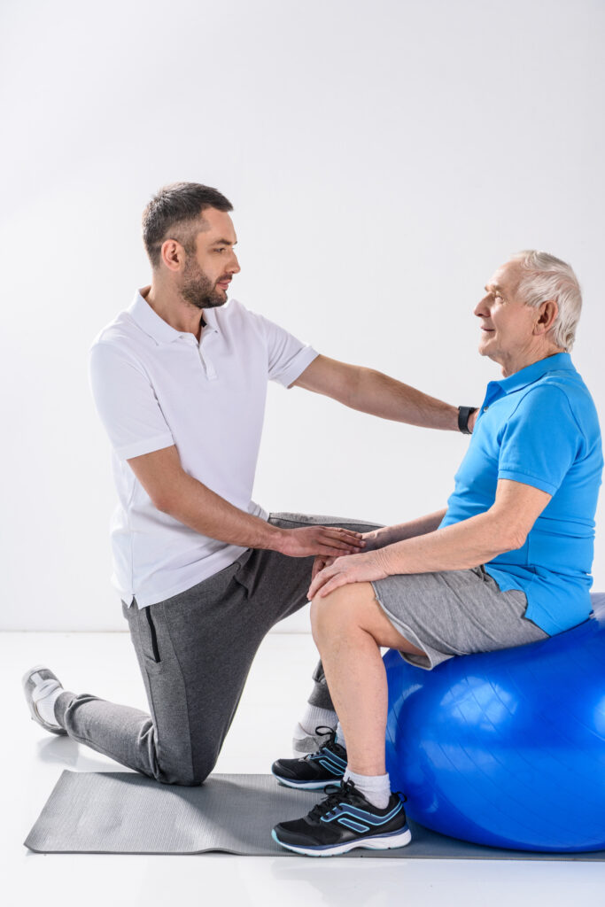 Bobath Therapie Einheit: Physiotherapeut mit Schlaganfall-Patient